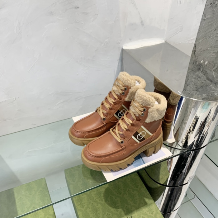 G*u*i boots